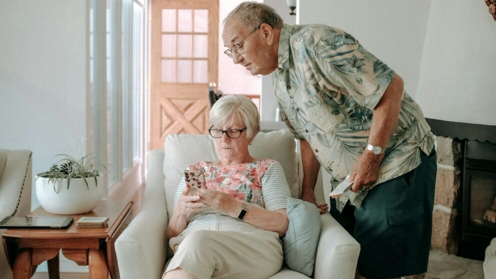 a woman and a man in a living room